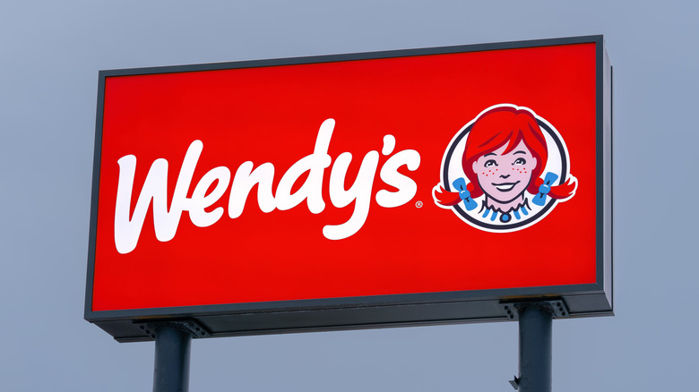 Wendy's sign against blue sky