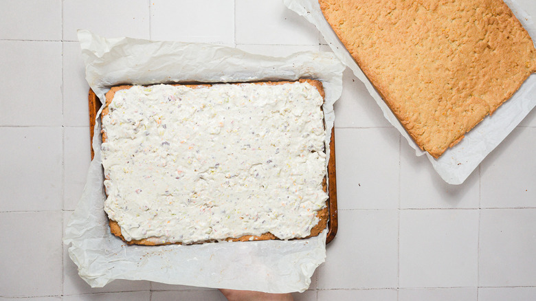 Cookie sheet with ice cream and another sheet beside