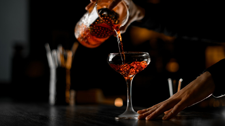 Bartender pouring a drink