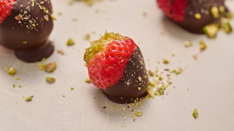chocolate dipped strawberries on parchment