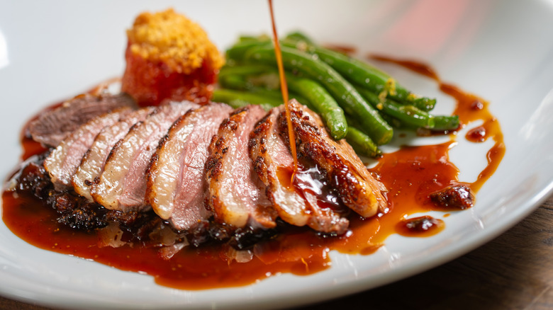 Sliced, plated duck confit