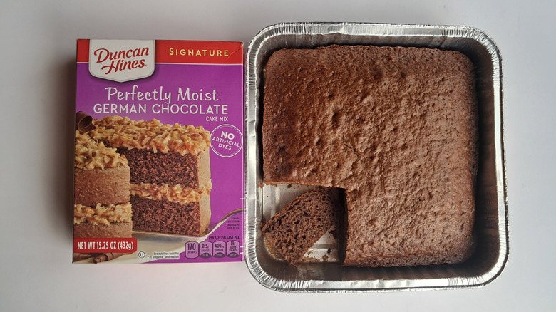 Top view of chocolate cake mix box and cake