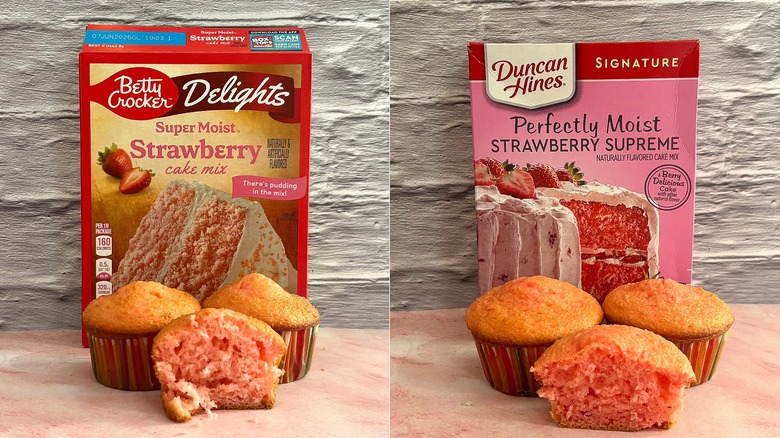 Betty Crocker and Duncan Hines strawberry cake mixes side by side behind strawberry cupcakes