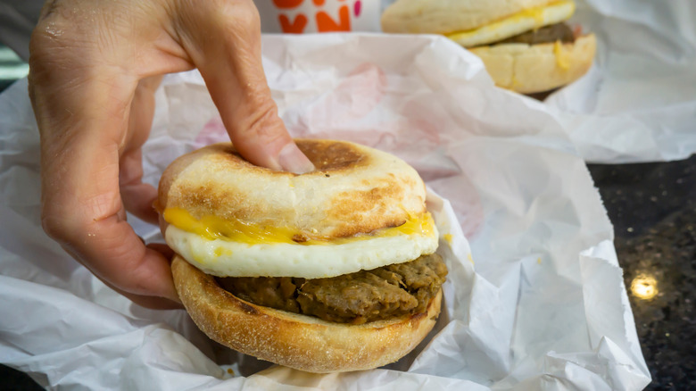 person ordering from Dunkin' plant based menu