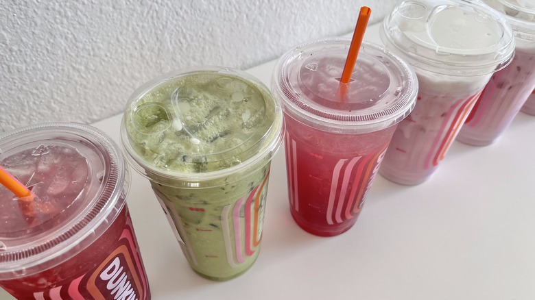 Close-up of Black Cherry Refreshers and Matcha Limeade from Dunkin'