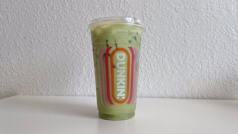 Dunkin' Matcha Limeade drink on a table