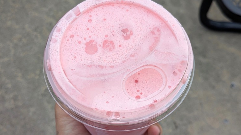 A top view of the Parke Daydream Refresher with foamy strawberry cold foam