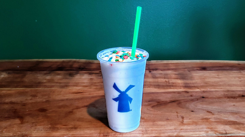 Dutch Bros Birthday Cake Shake on wood table