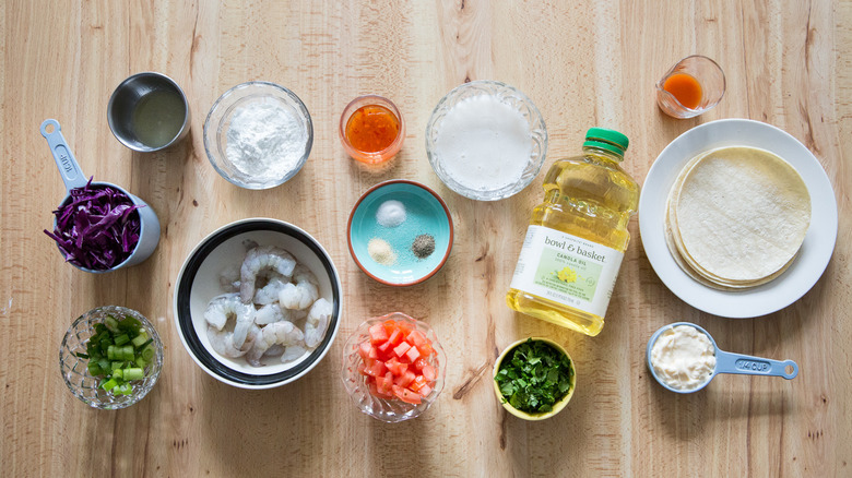 shrimp taco ingredients on table