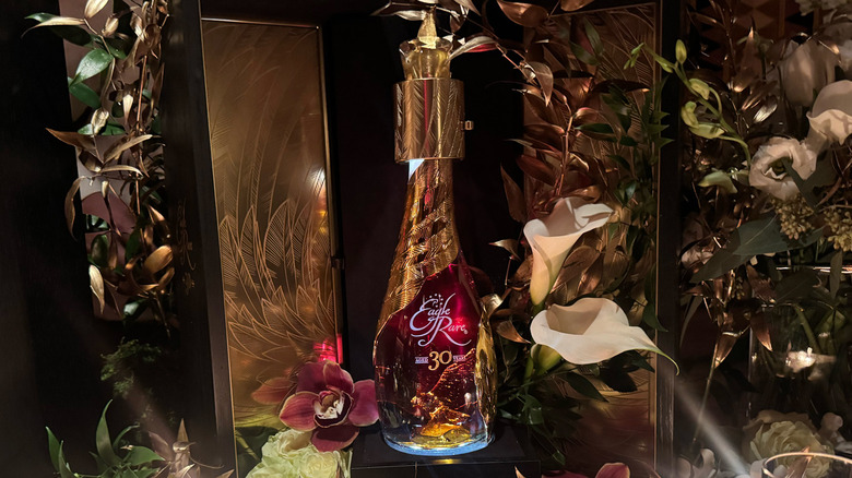 Eagle Rare 30 bottle, flowers