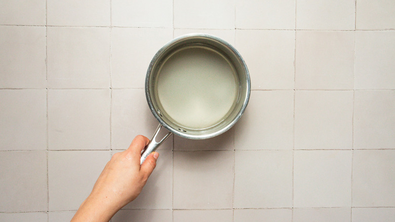 Sugar and water in saucepan