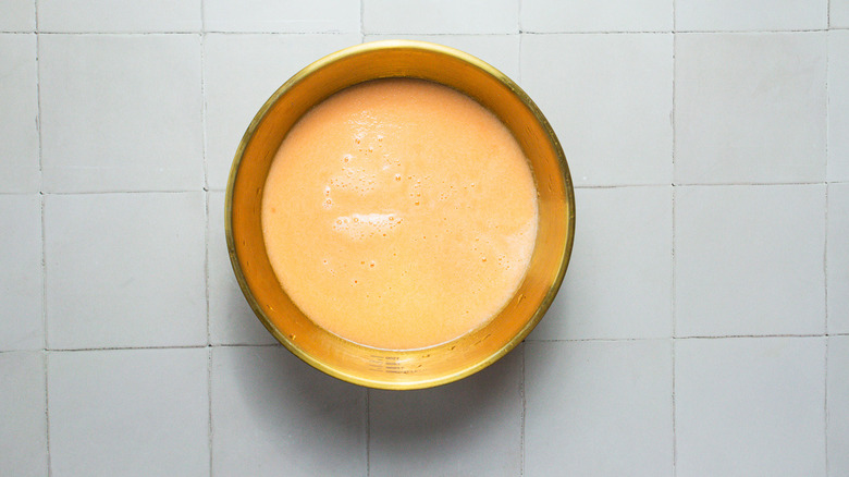 Liquid cantaloupe sorbet in bowl