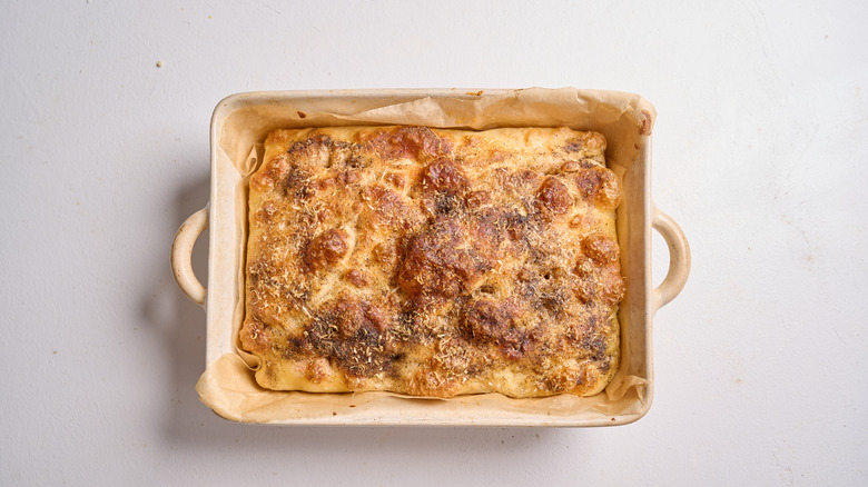 baked focaccia in a baking sheet