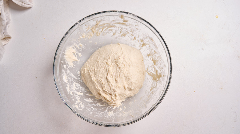 dough formed into a ball in bowl