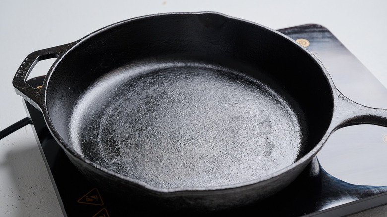 Heating a skillet on a stove