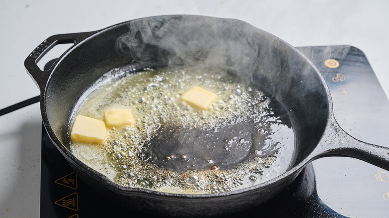melting butter in a skillet