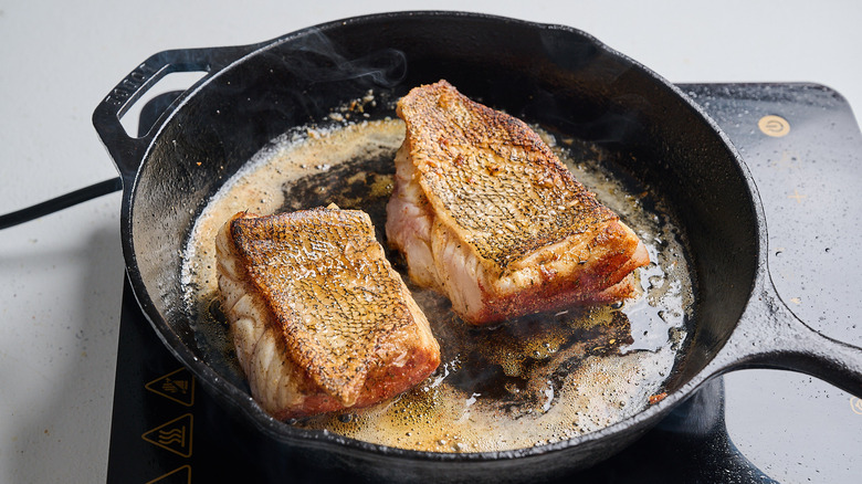 Grouper flipped to the opposite side to cook