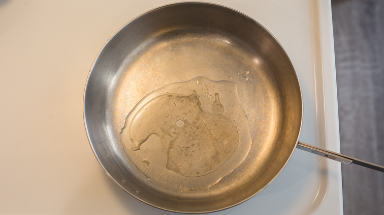 oil heating in metal skillet