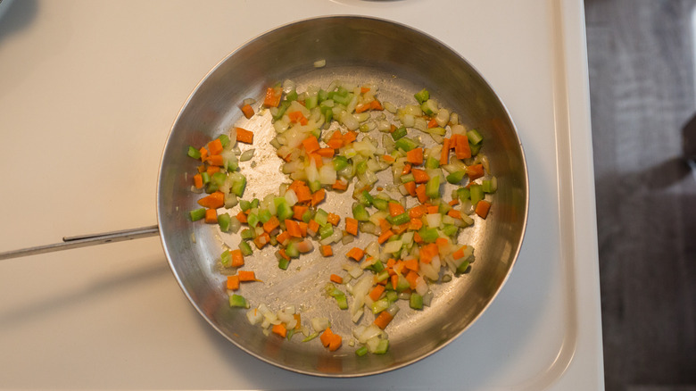 vegetables sauteing in skillet