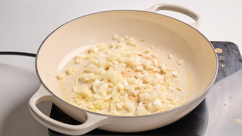 cooking the aromatics in a skillet