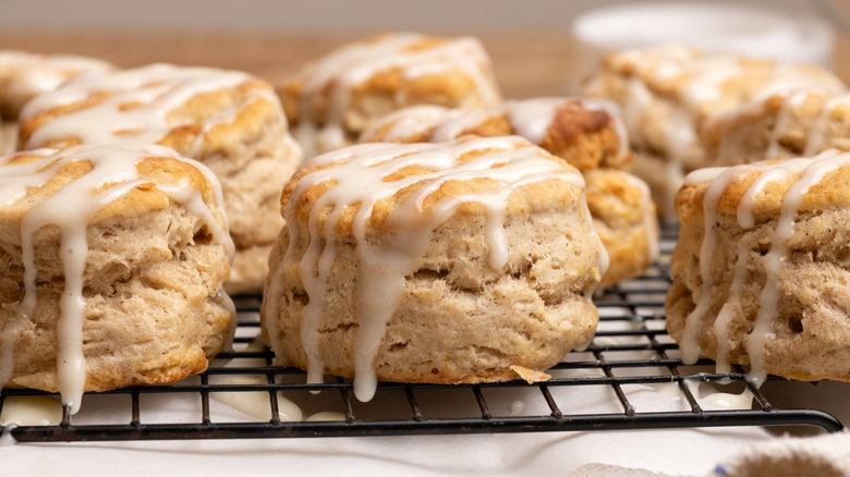 glazed cinnamon biscuits on wire rack