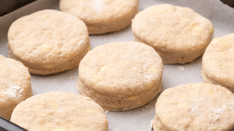 unbaked biscuits on baking sheet