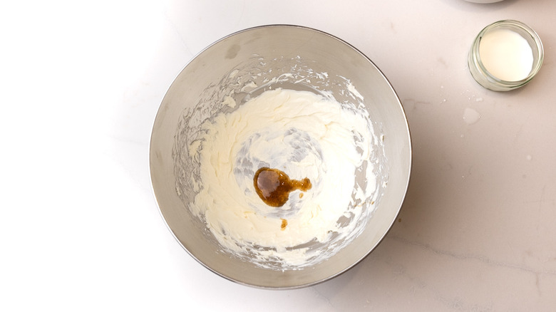cream cheese and vanilla in mixing bowl