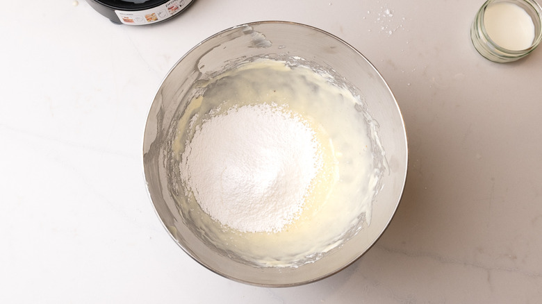 mixing powdered sugar into glaze