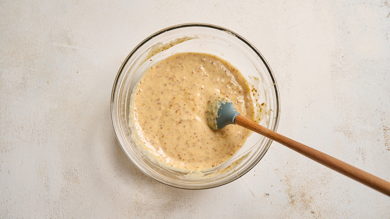 mixing honey mustard in a bowl