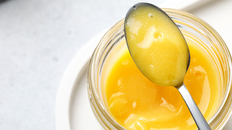 Lemon curd on a spoon
