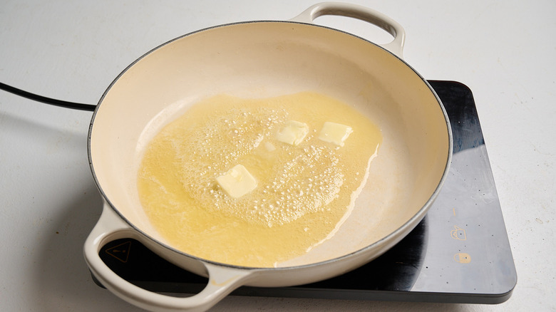 melting butter in a skillet