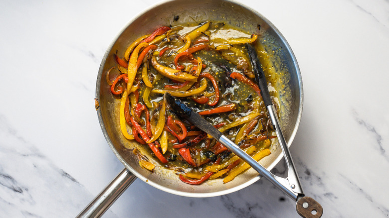 Fajita veggies in pan.