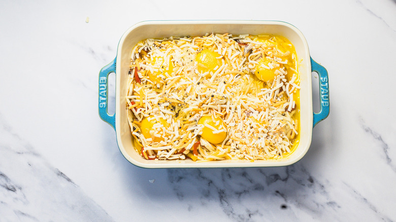 Layered casserole topped with eggs.