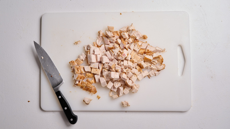 chopped chicken on a cutting board