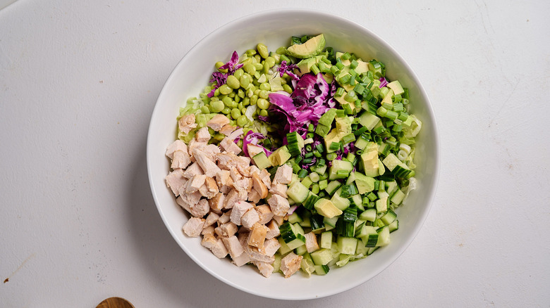 salad ingredients combined in a large bowl