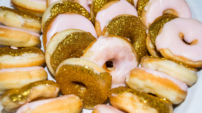 Gold glitter icing on donuts