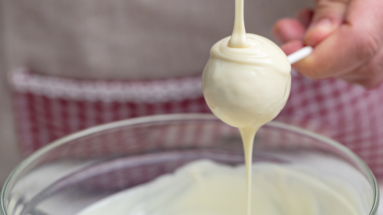 Coating cake pop in white chocolate