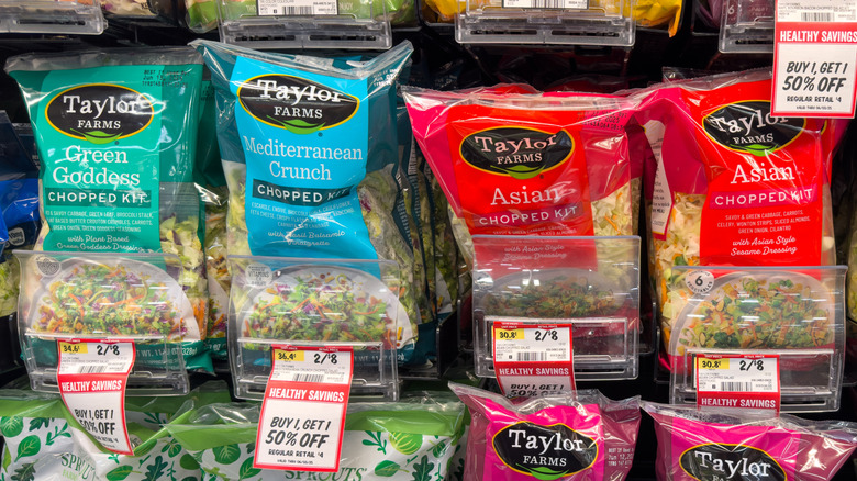 Taylor Farms branded salad kits displayed in grocery store