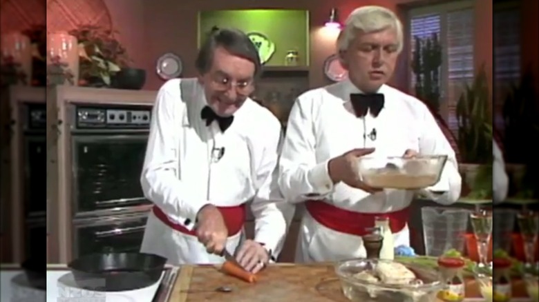 Hudson and Halls cutting carrots and cooking chicken