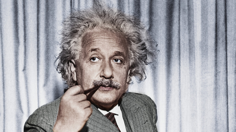 Albert Einstein with pipe in mouth