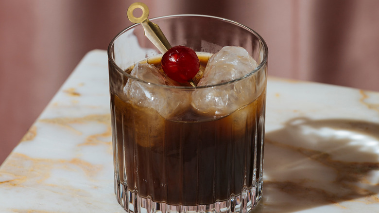 iced coffee cold brew with cherry