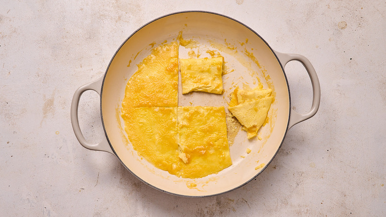 folding egg into miniature omelettes
