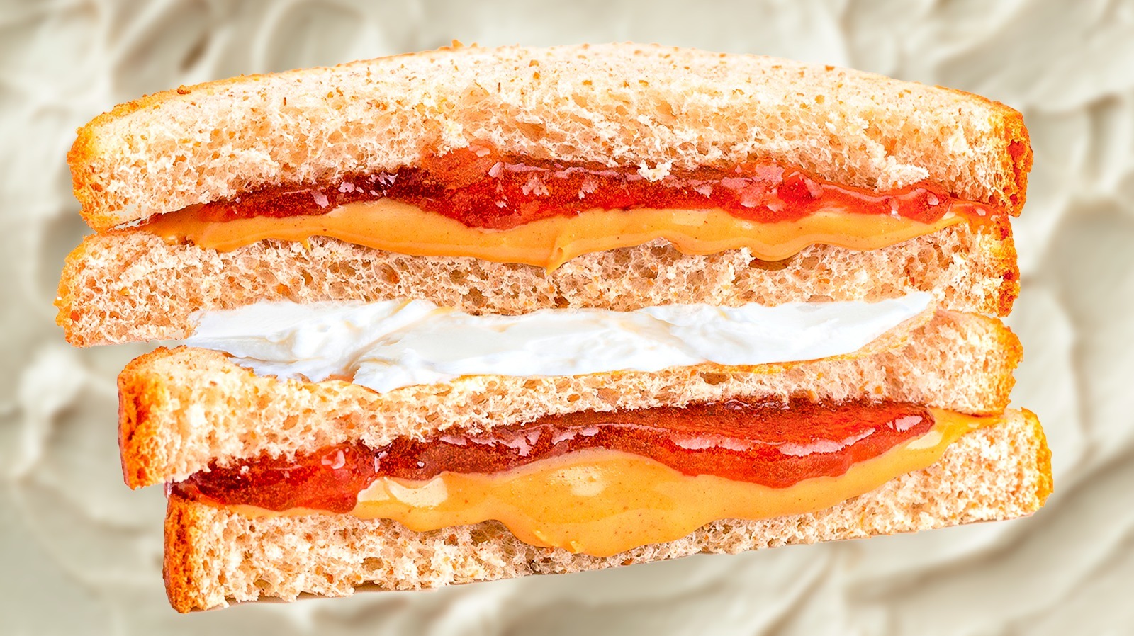 Elevate Peanut Butter And Jelly Sandwiches With A Swirl Of Cream Cheese
