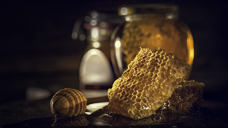 Honeycomb and a jar of honey