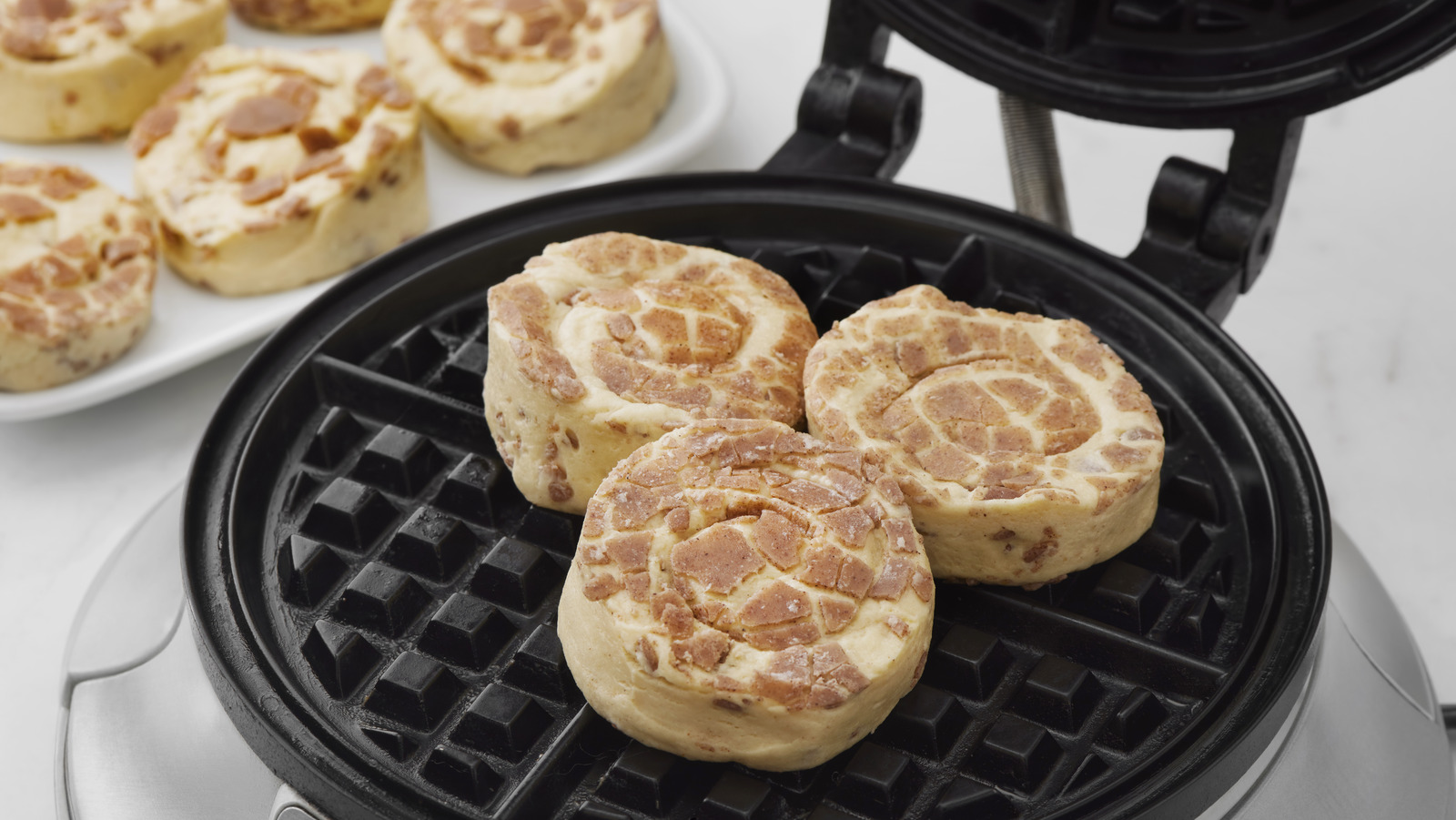 Elevate StoreBought Cinnamon Rolls By Pressing Them In A Waffle Iron