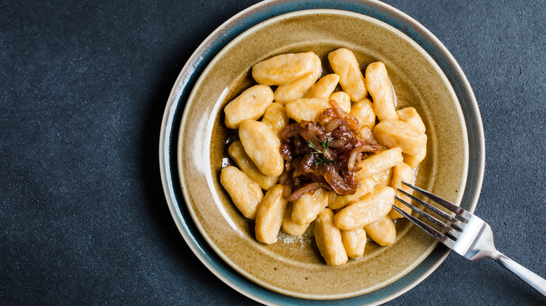 gnocchi topped with caramelized onions