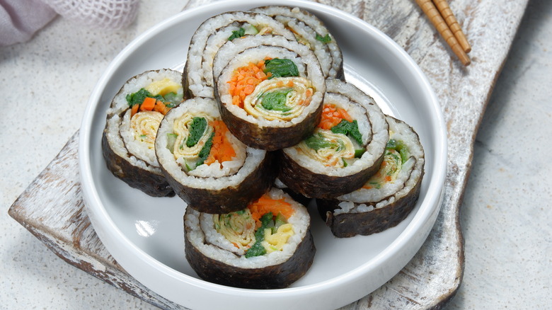 Kimbap piled on a white plate
