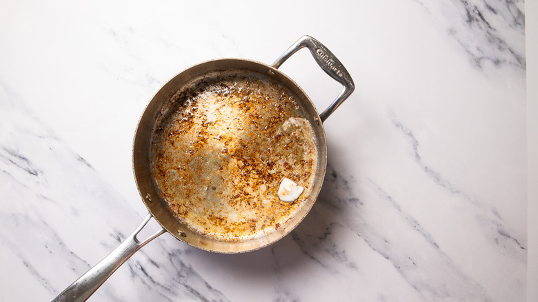 melted butter in pan