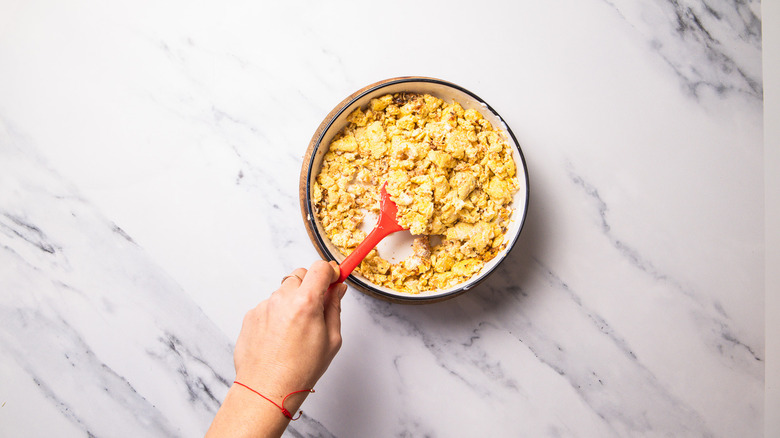 scrambled eggs in bowl with creme fraiche