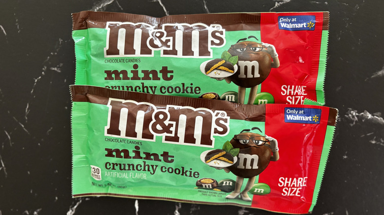 Two packages of M&M's Mint Crunchy Cookie candy